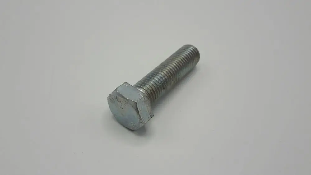 Sechskantschraube aus Metall, sichtbar mit einem zentralen Gewinde und einem flachen, hexagonalen Kopf. Marke: Remeha.